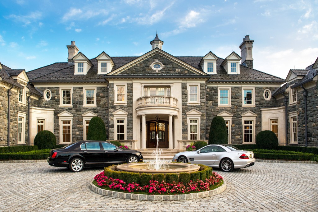 rich house with cars